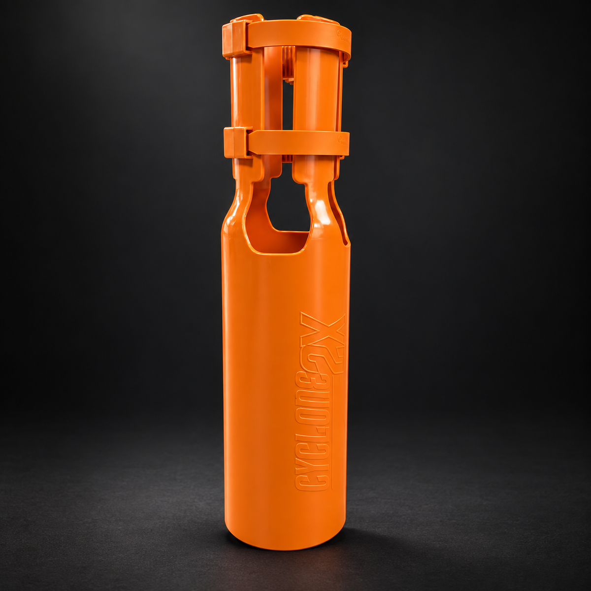 Cyclone2X orange attachment with dual straps on a dark background